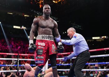 Trainer Malik Scott believes ex-title holder Deontay Wilder (foreground) broke his right hand while flooring WBC heavyweight champion Tyson Fury twice in the fourth round of his 11th-round TKO loss on Oct. 9. Wilder had surgery on Oct. 18 to repair the damage. (Premier Boxing Champions)  
