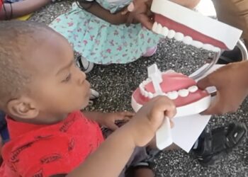 The Links, Incorporated, took part in a community collaboration in June to help children with dental health and reading skills. Photo credit: Allison Davis