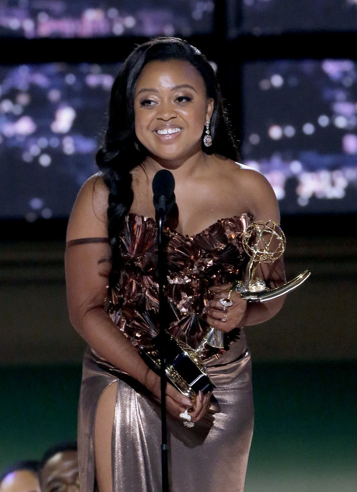 Quinta Brunson accepts the Outstanding Writing for a Comedy Series award for "Abbott Elementary" on stage during the 74th Annual Primetime Emmy Awards held at the Microsoft Theater on September 12, 2022. Photo credit: Chris Haston/NBC