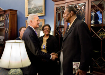 Earl Lloyd, the first Black American to play in the NBA, greets then-Vice President Joe Biden at Biden's office in the West Wing on Oct. 27, 2010. Photo credit: David Lienemann, The White House