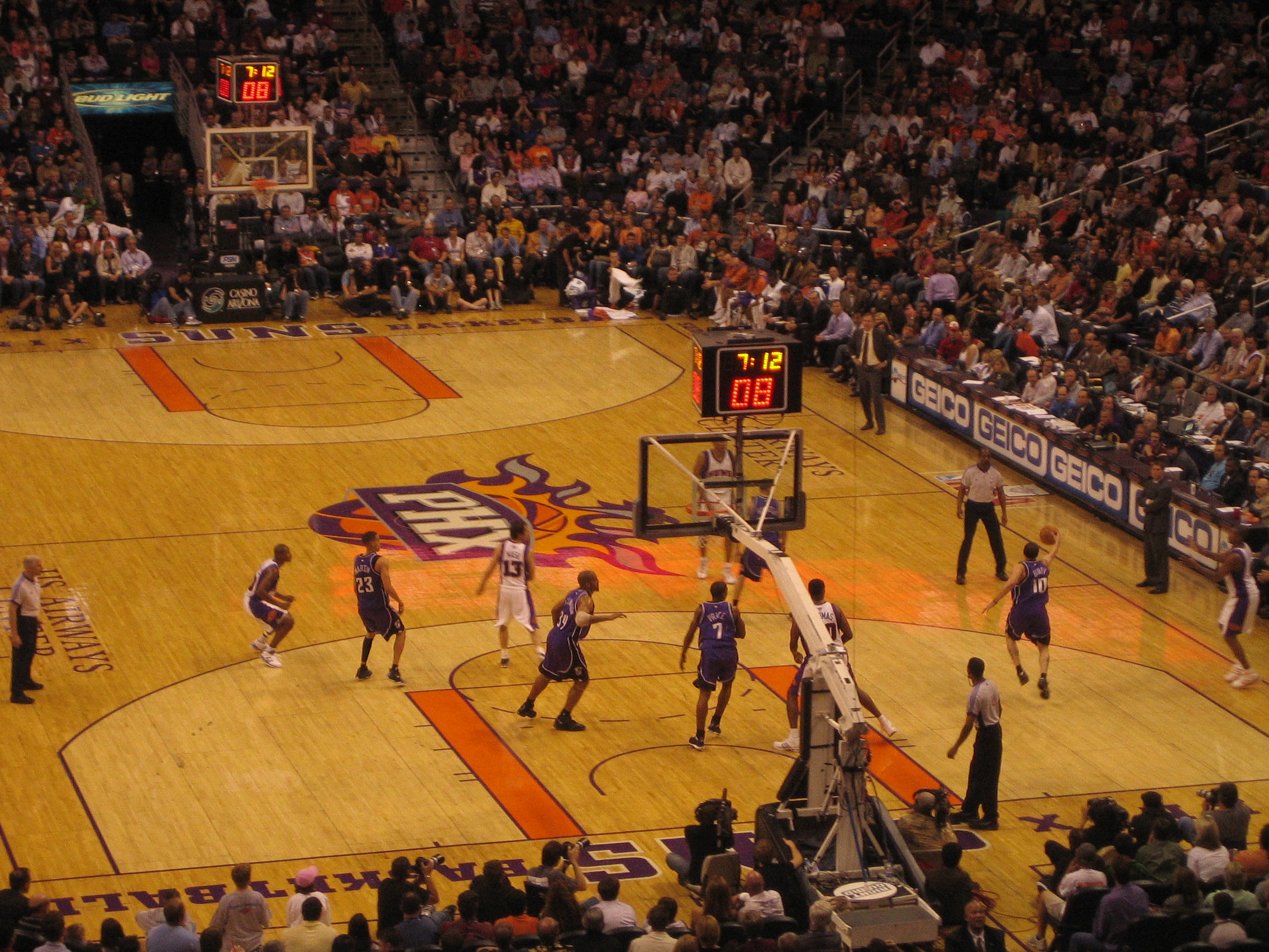 The Phoenix Suns in a game against the Sacramento Kings. Photo credit: John Knowles