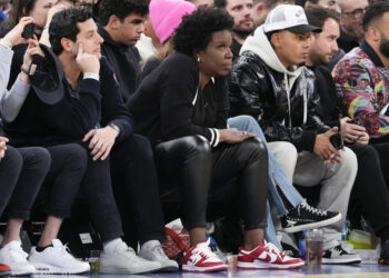 Comedian Leslie Jones watches the game action between the New York Knicks and the Indiana Pacers in the first half of their NBA basketball game, Wednesday, Jan. 11, 2023, at Madison Square Garden in New York. Jones will host TV's "The Daily Show" this week. Photo credit: Mary Altaffer, The Associated Press