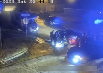This image from video released Friday, and partially redacted by the City of Memphis, shows Tyre Nichols seated and leaning against a car during a brutal attack by five Memphis police officers on Jan. 7, 2023, in Memphis, Tennessee. Nichols died Jan. 10. The five officers have since been fired and charged with second-degree murder and other offenses. Photo credit: The Associated Press