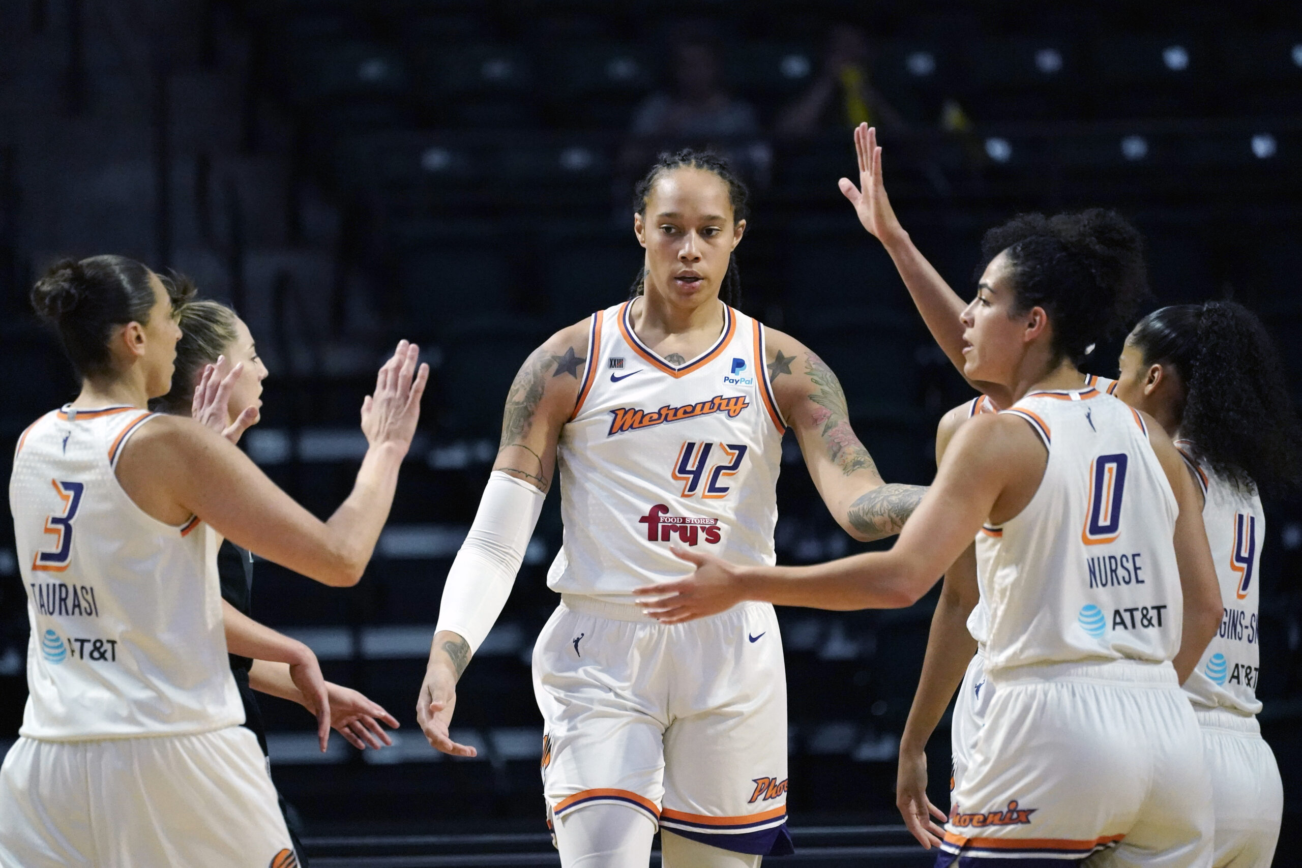 Brittney Griner, formerly of the Phoenix Mercury, is congratulated on a play against the Seattle Storm in the first half of the second round of the WNBA basketball playoffs Sunday, Sept. 26, 2021, in Everett, Washington. Griner, who was a free agent, re-signed with the Mercury on a one-year contract according to a person familiar with the deal. The person spoke to The Associated Press on condition of anonymity on Saturday, Feb. 18, 2023. Photo credit: Elaine Thompson, The Associated Press