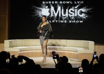 Rihanna poses for a photo after a halftime show news conference ahead of the Super Bowl 57 NFL football game, Thursday, Feb. 9, 2023, in Phoenix. Photo credit: Mike Stewart, The Associated Press