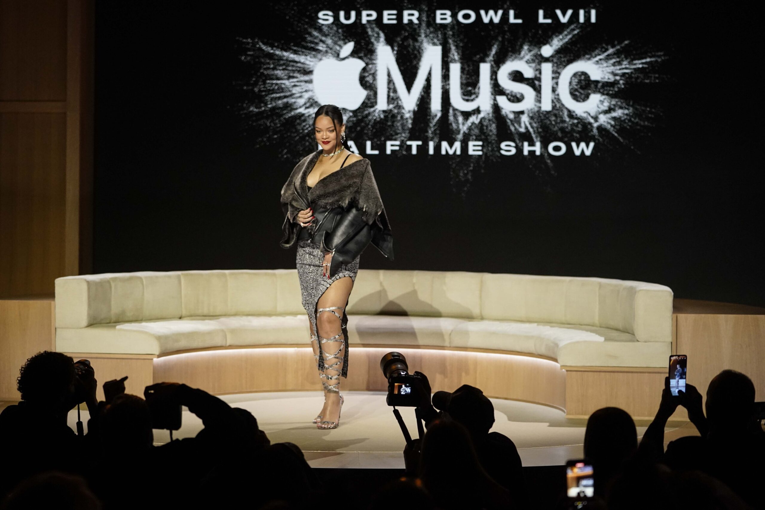 Rihanna poses for a photo after a halftime show news conference ahead of the Super Bowl 57 NFL football game, Thursday, Feb. 9, 2023, in Phoenix. Photo credit: Mike Stewart, The Associated Press