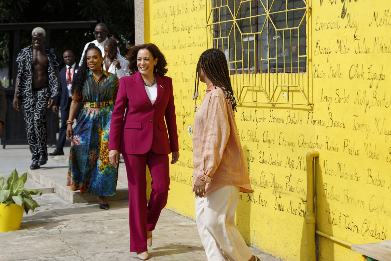 Vice President Kamala Harris, center, followed by actress Sheryl Lee Ralph, visits the Vibrate Space at the Freedom Skatepark in Accra, Ghana, on Monday, March 27, 2023. Vibrate Space is a workstation for young creative artists that includes a community recording studio and music business program. Harris is finishing a seven-day African visit that also took her to Tanzania and Zambia. Photo credit: Misper Apawu, The Associated Press
