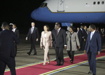 Vice President Kamala Harris and her husband, Douglas Emhoff, are welcomed by Tanzanian Vice President Philip Mpango as they arrive at Julius Nyerere International Airport in Dar es Salaam, Tanzania, on Wednesday, March 29, 2023. Photo credit: Ericky Boniphace, Pool Photo via The Associated Press