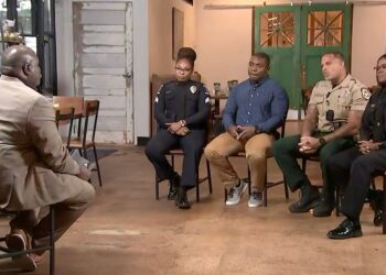 Ken Lemon, left, journalist with WSOC-TV in Charlotte, speaks with Black police officers about their experiences. Photo credit: WSOC-TV