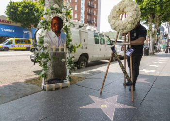 Flowers are placed on the Hollywood Walk of Fame star of actor/singer/activist Harry Belafonte on Tuesday, April 25, 2023, in Los Angeles. The civil rights and entertainment giant who began as a groundbreaking actor and singer and became an activist, humanitarian and conscience of the world, has died. He was 96. Photo credit: Damian Dovarganes, The Associated Press