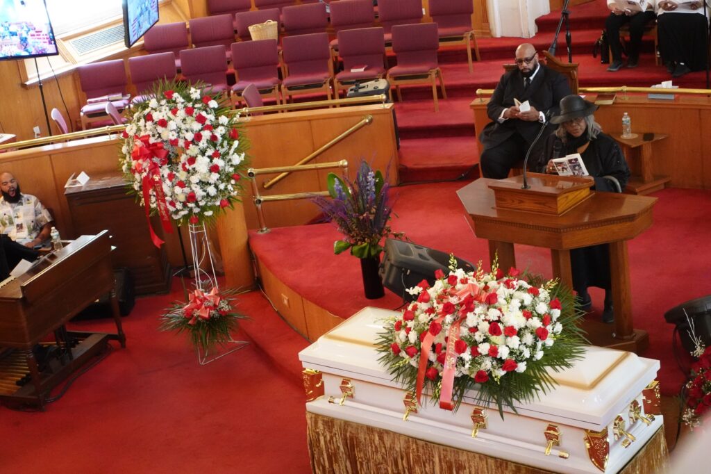 Jordan Neely's aunt, Mildred Mahazu, reads Neely's obituary at his funeral on Friday, May 19, 2023, at Mount Neboh Baptist Church in Harlem, New York. Neely died May 1 on the floor of a subway car after being placed in a chokehold by Daniel Penny, another passenger. Photo credit: Tamie Fowlkes, NABJ Black News & Views