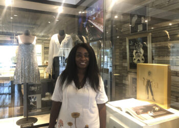 Lisa Lyons, 56, poses for a photo inside the Tina Turner Museum at the Flagg Grove School at the West Tennessee Delta Heritage Center on Wednesday, May 24, 2023, in Brownsville, Tenn. Turner, the unstoppable singer and stage performer who teamed with husband Ike Turner for a dynamic run of hit records and live shows in the 1960s and ‘70s and triumphed in middle age with the chart-topping "What's Love Got to Do With It," has died at 83. Turner died Wednesday after a long illness in her home in Kuesnacht near Zurich, Switzerland, according to her manager. Photo credit: Adrian Sainz