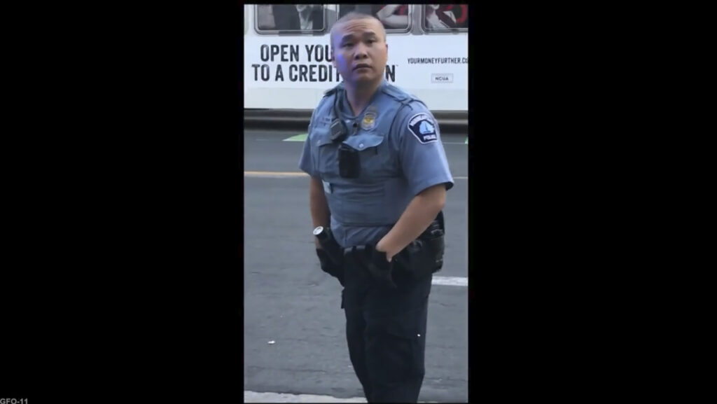 In this screen grab from video, former Minneapolis police officer Tou Thao appears at the scene where George Floyd died at the hands of former police officer Derek Chauvin, on May 25, 2020, in Minneapolis, Minn. Thao, who held back bystanders while his colleagues restrained a dying George Floyd, was found guilty on Monday, May 1, 2023 of aiding and abetting manslaughter. On Aug. 7, 2023, he was sentenced to 5 years in prison. Photo credit: Court TV via AP, pool