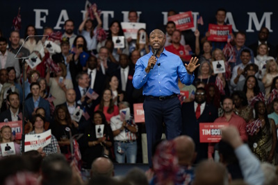 U.S. Sen. Tim Scott, R-South Carolina, is shown announcing his now-cancelled run for the 2024 Republican presidential nomination at a campaign event on May 22, 2023, in North Charleston, South Carolina. Scott, who is the ranking member of the Senate Banking, Housing, and Urban Affairs Committee, has been floated as a potential running mate to Donald Trump. Photo credit: Allison Joyce, Getty Images