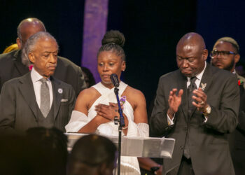 Pamela Dias, the mother of Ajike Owens, center, makes a statement with Rev. Al Sharpton, left, and civil rights attorney Benjamin Crump, right, during the funeral for Owens on Monday, June 12, 2023, at Meadowbrook Church in Ocala, Florida. Owens was fatally shot by her neighbor, Susan Lorincz, when she went to Lorincz's door. Lorincz was arrested and charged in the shooting. Photo credit: Alan Youngblood, The Associated Press