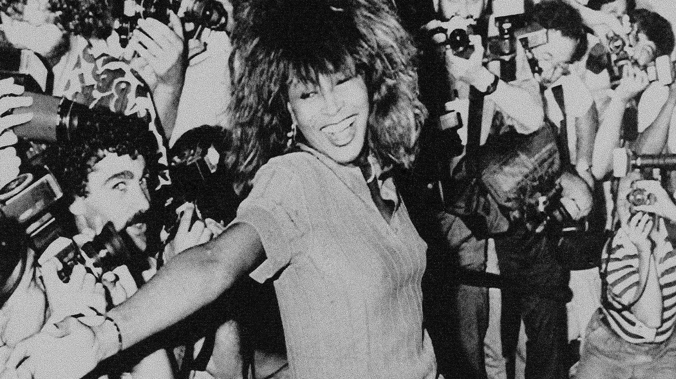 Tina Turner, then 48, is shown dancing a few steps for photographers upon arrival at the Sheraton Hotel in Buenos Aires, Argentina, on January 2, 1988. Turner, who died in May, performed the next day at the River Plate Stadium before 60,000 fans. Photo credit: Alejandro Querol, The Associated Press