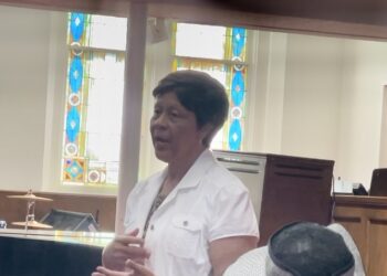 The Rev. Carolyn McKinstry shares her story with journalists from inside the 16th Street Baptist Church in Birmingham, Alabama, on Aug. 5, 2023. McKinstry was there when a bomb blew up the side of the church on Sept. 15, 1963., killing four little girls.