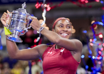 Coco Gauff holds up the championship trophy after defeating Aryna Sabalenka, of Belarus, in the women's singles final of the U.S. Open tennis championships, Saturday, Sept. 9, 2023, in New York. Photo credit, Frank Franklin II, The Associated Press