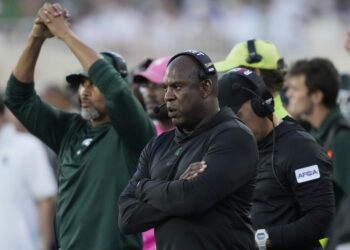 Michigan State head coach Mel Tucker watches from the sideline during the first half of an NCAA college football game against Central Michigan, Friday, Sept. 1, 2023, in East Lansing, Mich. Photo credit: Carlos Osorio, The Associated Press