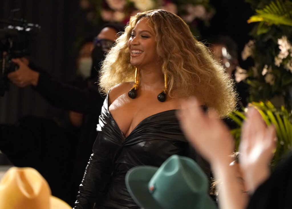 Beyonce appears in the audience before accepting the award for best rap song for "Savage" at the 63rd annual Grammy Awards at the Los Angeles Convention Center on Sunday, March 14, 2021. Beyonce wrapped up her Renaissance World Tour in early October 2023, but fans can also see parts of the tour in a film to be released in December. Photo credit: Chris Pizzello, The Associated Press