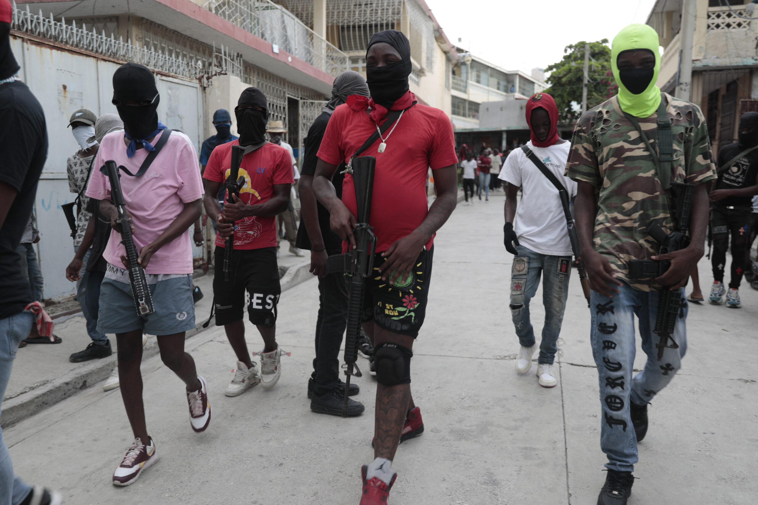 Armed members of "G9 and Family" march in a protest against Haitian Prime Minister Ariel Henry in Port-au-Prince, Haiti, Tuesday, Sept. 19, 2023. Photo credit: Odelyn Joseph