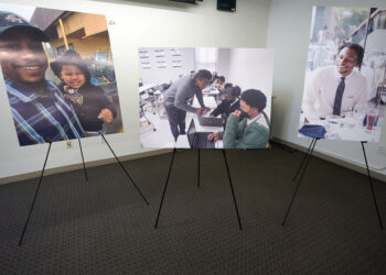 Pictures of teacher Keenan Anderson, 31, who was Tasered multiple times during a struggle with LAPD officers in Venice and died at a hospital, are displayed at a news conference to announce the filing of a $50 million claim against the city of Los Angeles over his death on Jan. 20, 2023. The Los Angeles Police Commission said on Tuesday, Oct. 24, that two officers involved in the fatal struggle with Anderson violated the LAPD's policy on use of lethal force. Photo credit: Damian Dovarganes, The Associated Press