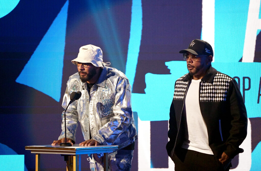 n this image released on Oct. 10, 2023, Swizz Beatz and Timbaland speak onstage during the BET Hip-Hop Awards 2023 on October 03, 2023 in Atlanta, Georgia. Photo credit: Bennett Raglin, Getty Images