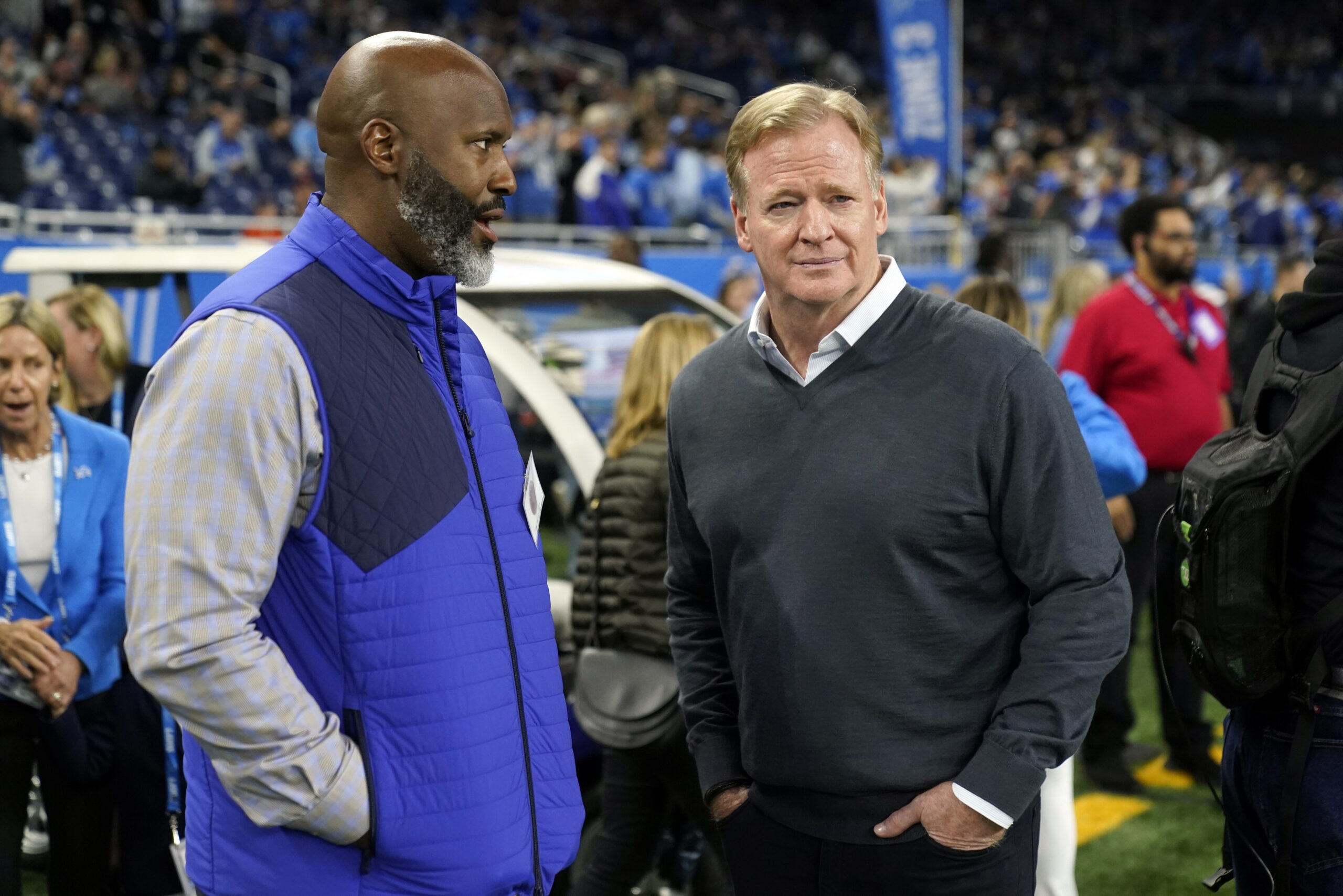 Detroit Lions general manager Brad Holmes, left, talks with NFL Commissioner Roger Goodell before the first half of an NFL football game, Sunday, Nov. 19, 2023, in Detroit. Photo credit: Paul Sancya, The Associated Press
