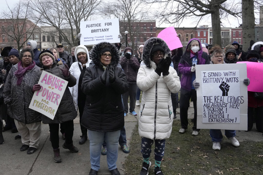Supporters of Brittany Watts cheer at a rally Thursday, Jan. 11, 2024, in Warren, Ohio. A grand jury has decided that Watts, who was facing criminal charges for her handling of a home miscarriage, will not be formally charged. Photo credit: Sue Ogrocki, The Associated Press