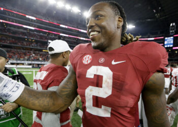Alabama running back Derrick Henry (2) greets Wisconsin players after an NCAA college football game Saturday, Sept. 5, 2015, in Arlington, Texas. Henry rushed for 147 yards with three touchdowns and No. 3 Alabama ran away with a 35-17 victory over No. 20 Wisconsin in the season opener for both teams. Photo credit: LM Otero, The Associated Press