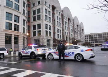 Police stand guard as they wait for former President Donald Trump to arrive at federal court house in Washington, Tuesday, Jan. 9, 2024. Photo credit: Susan Walsh, The Associated Press
