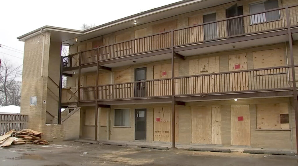 This photo taken from video provided by ABC 7 Chicago shows an apartment building complex that was boarded up with plywood, Sunday, Jan. 7, 2024, in Harvey, Illinois. Some residents said that they were still inside their units when the boarding began. Photo credit: ABC 7 Chicago via The Associated Press