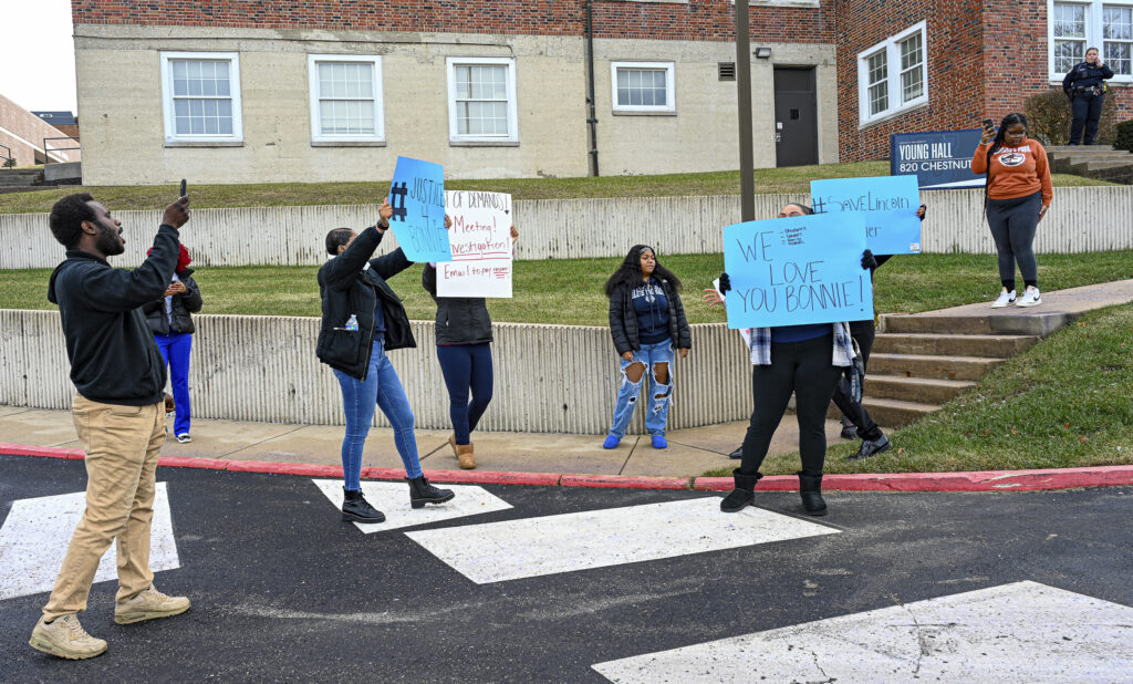 Lincoln University of Missouri students protest outside the administration building calling for the removal of school President John Moseley, Friday, Jan. 12, 2024, in Jefferson City, Missouri. The president of the historically Black college in Missouri was placed on paid leave following the high-profile death of an administrator. The Board of Curators at Lincoln University, a publicly funded school of about 1,800 in Jefferson City, said Friday in a news release that President John Moseley volunteered to step down while a third-party expert reviews “potential personnel issues and concerns.” Photo credit:Julie Smith, The Jefferson City News-Tribune via The Associated Press