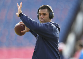 Denver Broncos quarterback Russell Wilson (3) warms up before an NFL football game between the Denver Broncos and the Los Angeles Chargers, Sunday, Dec. 31, 2023, in Denver. Photo credit: Jack Dempsey, The Associated Press