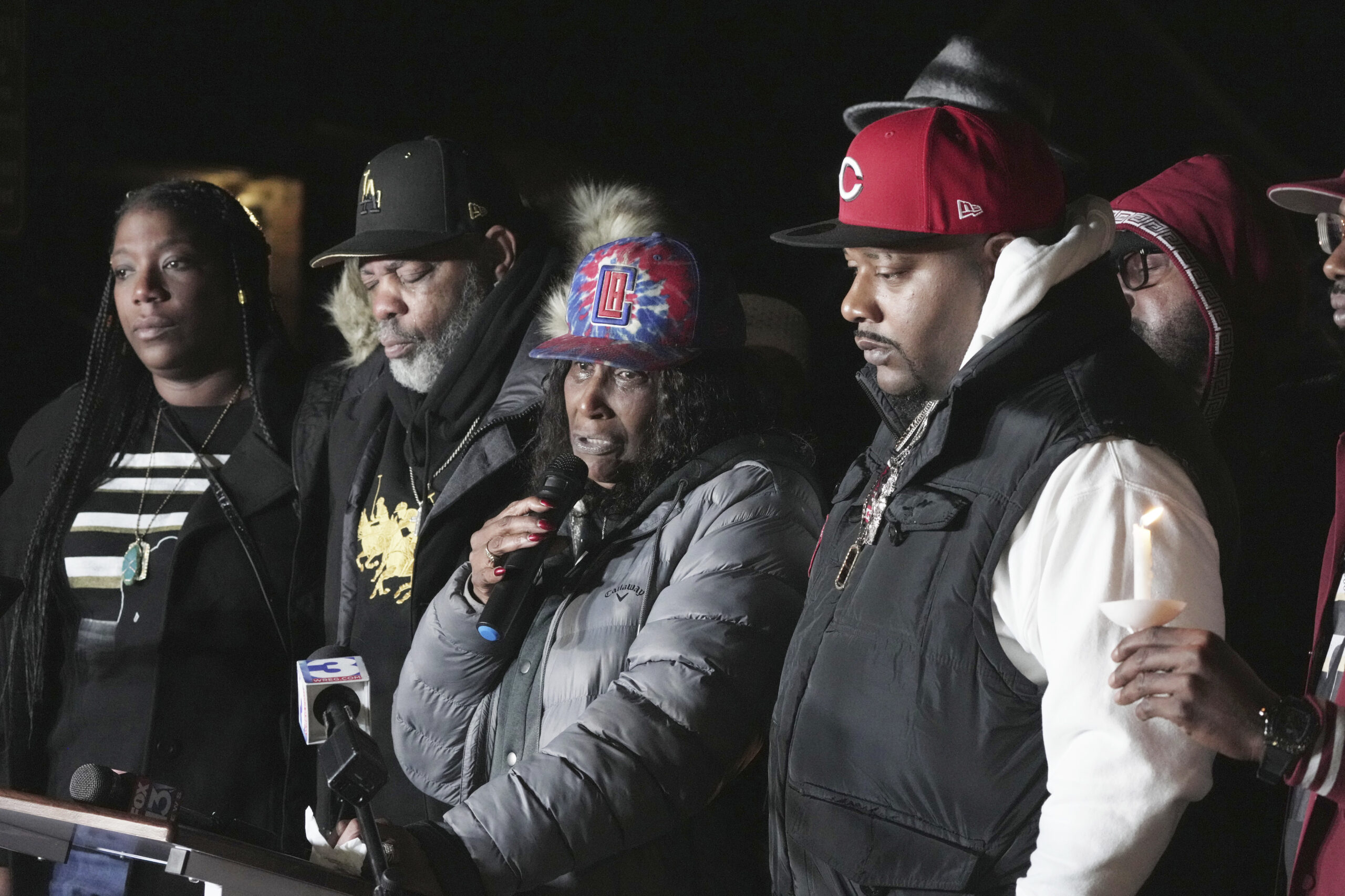 RowVaughn Wells, second from left, the mother of Tyre Nichols, flanked by family members of Nichols, speaks during a candlelight vigil on the anniversary of her son's death Sunday, Jan. 7, 2024, in Memphis, Tenn. Nichols lost his life following a violent beating by five Memphis Police officers in January 2023. Photo credit: Karen Pulfer Focht, The Associated Press