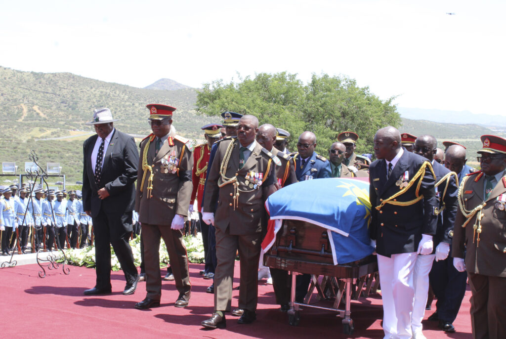 Pallbearers carry the flag-draped coffin of the late Namibian President Hage Geingob during his funeral service in Windhoek, Namibia, Sunday, Feb. 25, 2024. Photo credit: Esther Mbathera