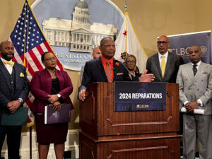 California state Assemblyman Reggie Jones-Sawyer, D-Los Angeles, speaks about a package of reparations legislation at a press conference at the state capitol in Sacramento, California, on Wednesday, Feb. 21, 2024. Photo creditt: Sophie Austin, Report for America/The Associated Press