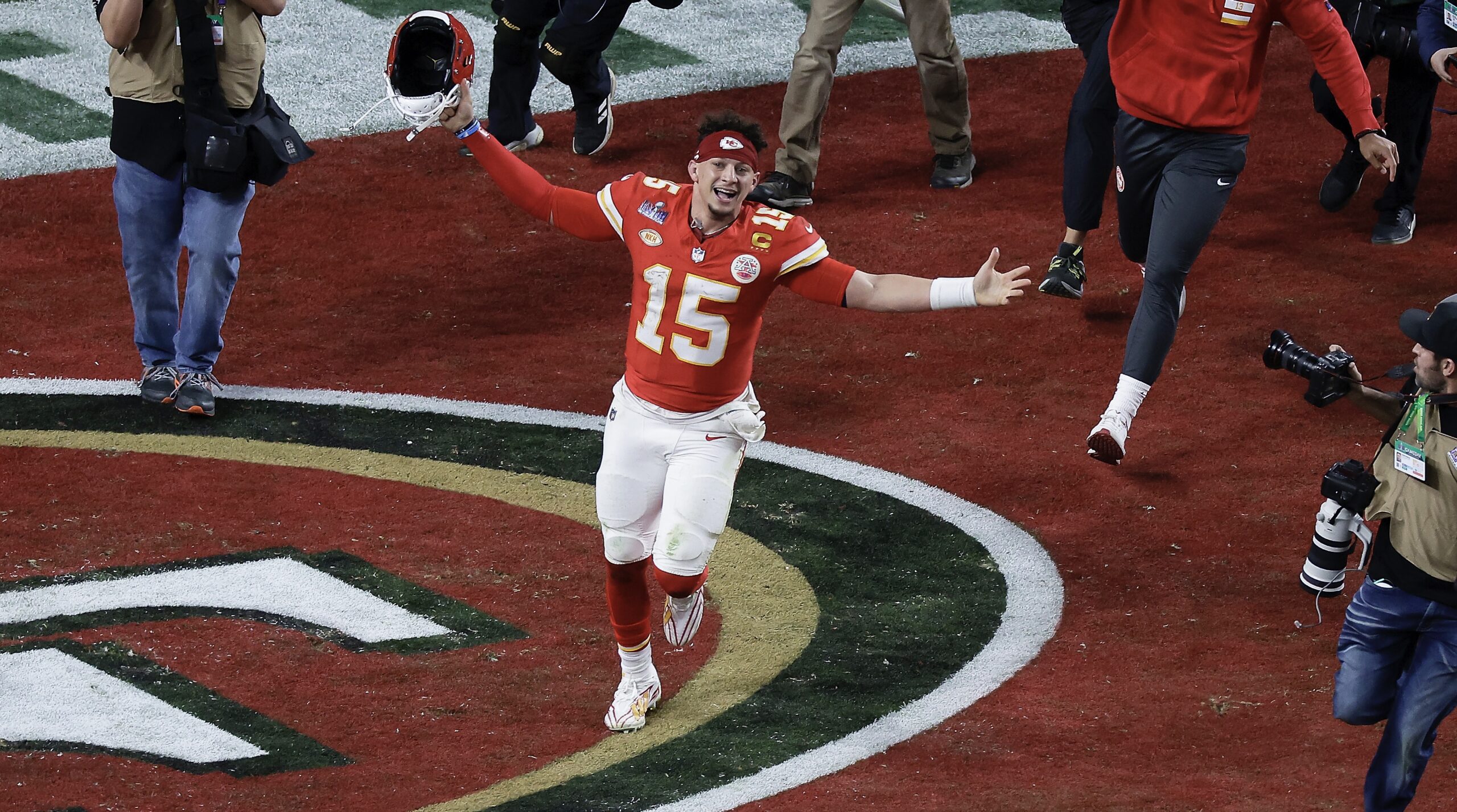 Kansas City Chiefs quarterback Patrick Mahomes celebrates after throwing the game-winning touchdown against the San Francisco 49ers during overtime of the NFL Super Bowl 58 football game Sunday, Feb. 11, 2024, in Las Vegas. Photo credit: Adam Hunger, The Associated Press