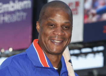 Former New York Mets baseball player Darryl Strawberry poses at Citi Field in New York Aug. 1, 2010. The former New York Mets and Yankees star is recovering from a heart attack at SSM Health St. Joseph Hospital in Lake St. Louis, Missouri. Mets spokesman Jay Horwitz said Tuesday, March 12, 2024, that Strawberry was stricken Monday, a day before the eight-time All-Star's 62nd birthday. Photo credit: Seth Wenig, The Associated Press