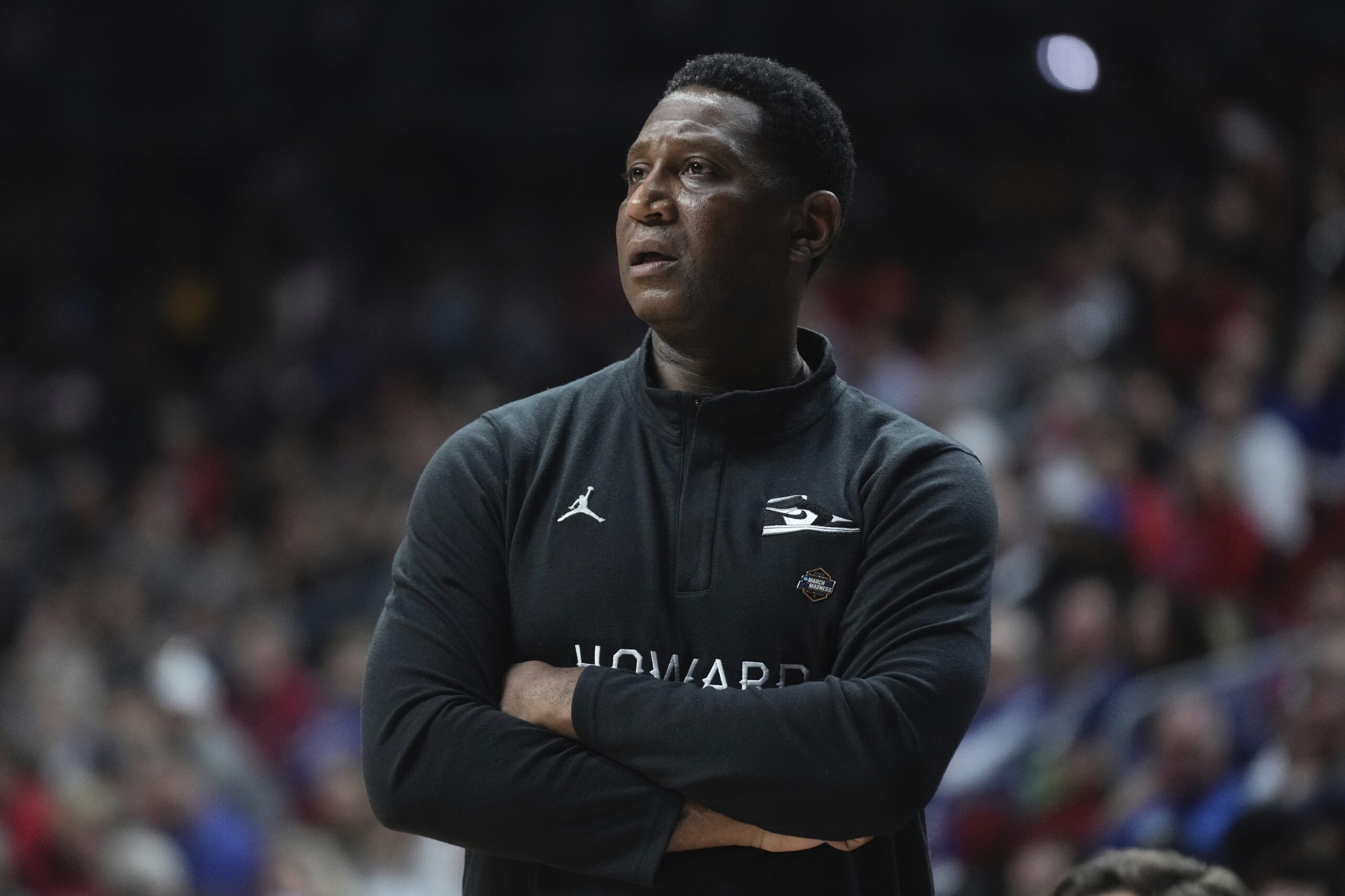 Howard University head basketball coach Kenny Blakeney watches during the first half of a first-round college basketball game in the NCAA Tournament Thursday, March 16, 2023, in Des Moines, Iowa. Photo credit: Morry Gash, The Associated Press