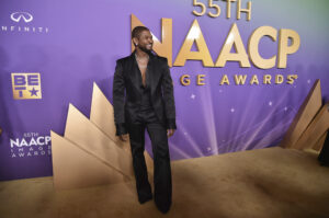 Usher arrives at the 55th NAACP Image Awards on Saturday, March 16, 2024, at The Shrine Auditorium in Los Angeles. Photo credit: Richard Shotwell/Invision/The Associated Press