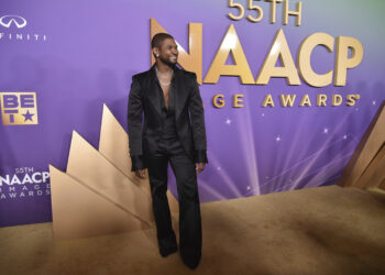 Usher arrives at the 55th NAACP Image Awards on Saturday, March 16, 2024, at The Shrine Auditorium in Los Angeles. Photo credit: Richard Shotwell/Invision/The Associated Press