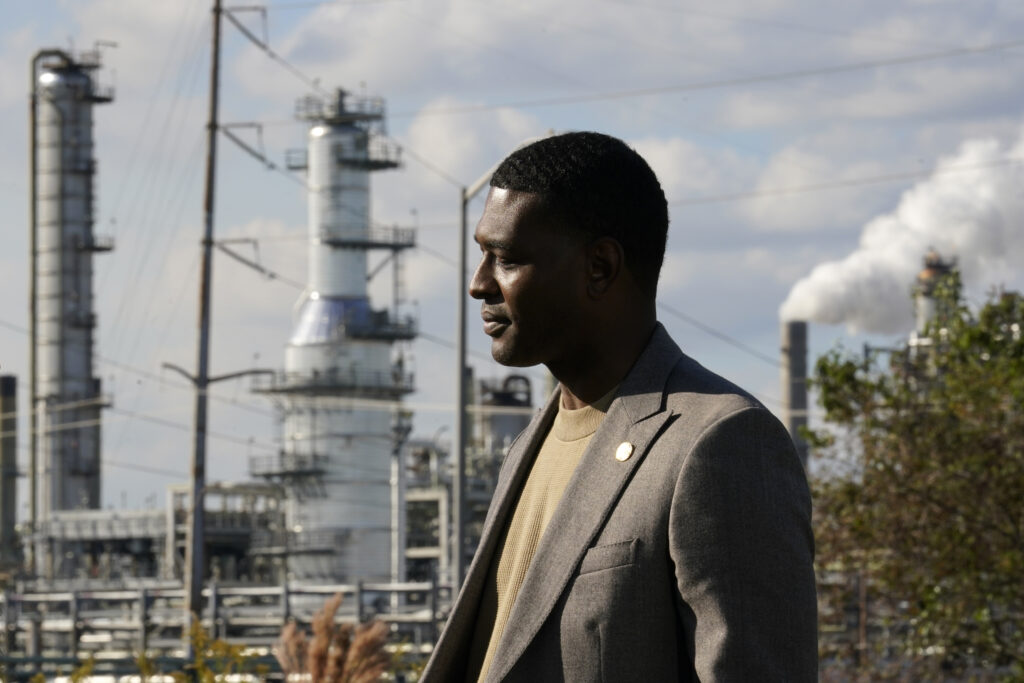 Environmental Protection Agency Administrator Michael Regan stands near the Marathon Petroleum Refinery as he conducts a television interview, while touring neighborhoods that abut the refinery in Reserve, Louisiana, on Nov. 16, 2021. More than 20 Republican attorneys general on April 16, 2024, asked the EPA to stop investigating environmental policies that disproportionately harm Black people but aren't intentionally discriminatory. The petition is unlikely to convince the Biden administration to back away from an issue Regan has taken pains to highlight, like visiting the industrial stretch of Louisiana typically known as Cancer Alley. Photo credit: Gerald Herbert, The Associated Press