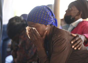 Family members of the bus crash victims gather at the ZCC Church in the Molepolole village near Gaborone, Botswana, Friday, March 29, 2024. A bus carrying Easter pilgrims from Botswana to Moria in South Africa crashed en route in Mokopane, South Africa, claiming the lives of some 45 people. An 8-year-old survived. Photo credit: The Associated Press