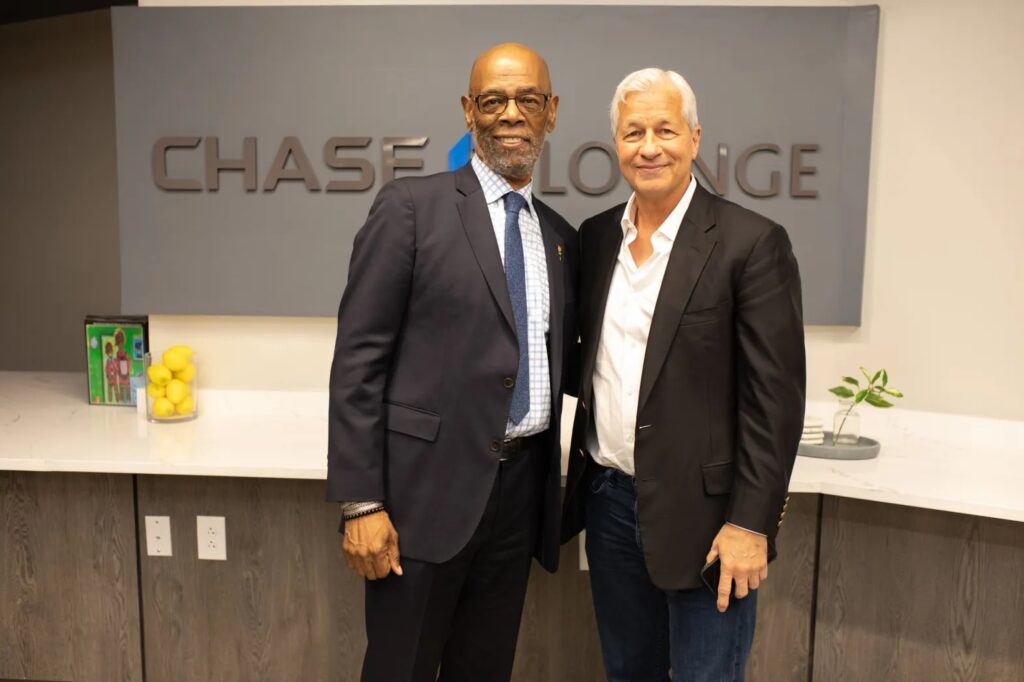 James A. Washington, left, president and general manager of The Atlanta Voice, poses for a photograph with Chairman and Chief Executive Officer of JPMorgan Chase, Jamie Dimon, at the Russell Innovation Center and Entrepreneurship in Atlanta, Georgia, on March 2, 2022. Photo credit: Itoro N. Umontuen, The Atlanta Voice