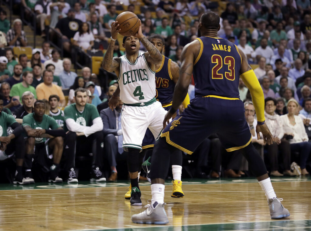 Boston Celtics guard Isaiah Thomas (4) prepares to shoot as Cleveland Cavaliers forward LeBron James (23) defends during the first quarter of Game 1 of the NBA basketball Eastern Conference finals, Wednesday, May 17, 2017, in Boston. Photo credit: Charles Krupa, The Associated Press