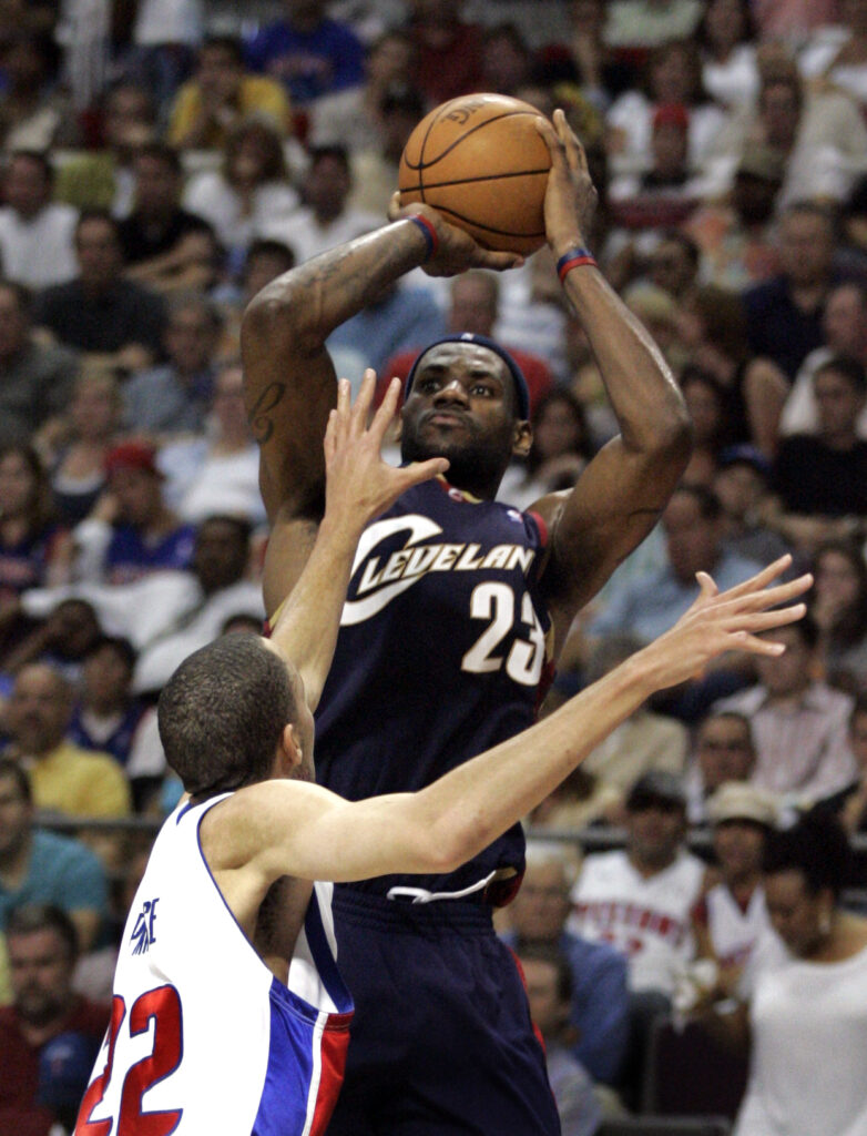Then-Cleveland Cavaliers forward LeBron James (23) shoots over the defense of then-Detroit Pistons forward Tayshaun Prince during the third quarter of an NBA Eastern Conference final basketball game at the Palace of Auburn Hills, Michigan, on Thursday, May 31, 2007. Photo credit: Duane Burleson, The Associated Press