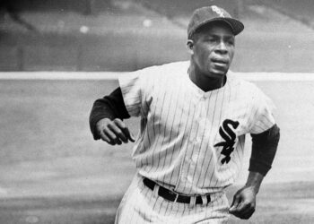 Minnie Minoso, Chicago White Sox outfielder, practices running the bases at Comiskey Park in Chicago, June 1, 1955. Major League Baseball said Tuesday, May 28, 2024, that it has incorporated records for more than 2,300 Negro Leagues players following a three-year research project. Miñoso was credited with 150 hits with the New York Cubans of the second Negro National League from 1946-1948, raising his total to 2,113. Photo credit: The Associated Press