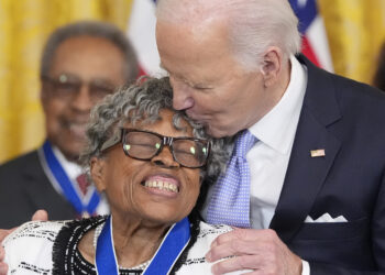 President Joe Biden awards the nation's highest civilian honor, the Presidential Medal of Freedom, to Opal Lee during a ceremony in the East Room of the White House, Friday, May 3, 2024, in Washington. Lee's persistent activism helped make Juneteenth a national holiday. Photo credit: Alex Brandon, The Associated Press
