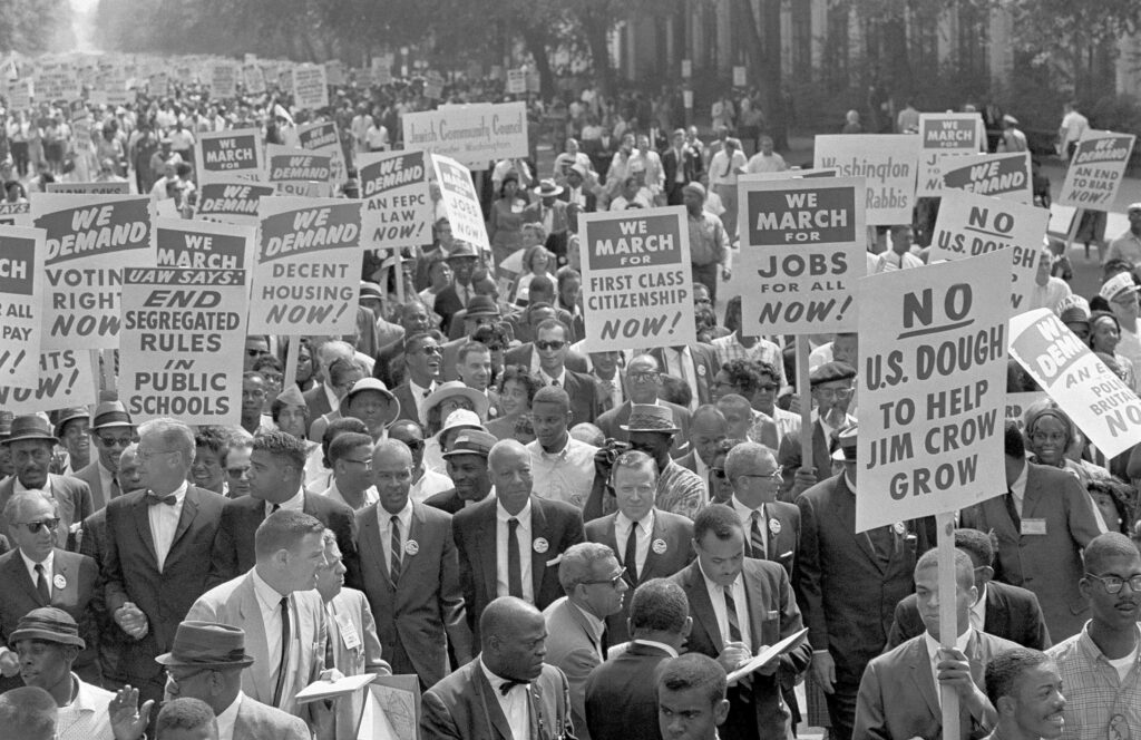 Racial divisions in the United States were brought to the attention of the world by the watershed March on Washington, Sept. 6, 1963. Protests, rallies, sit-ins and marches are hall marks of American history. Photo credit: The Associated Press